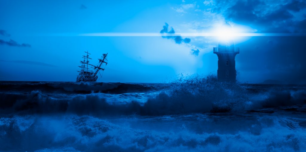 A ghostly lighthouse and a ship at night